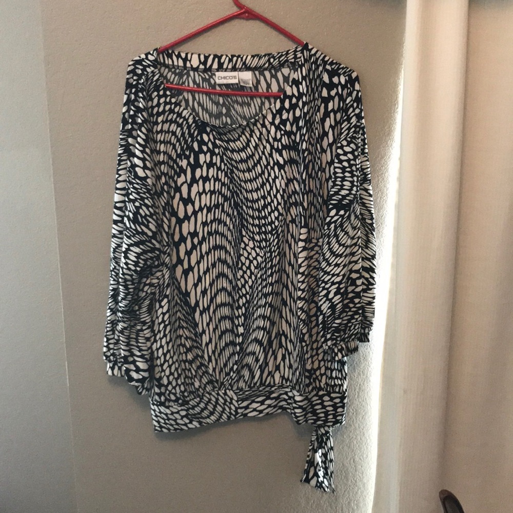 Black and white spotted blouse with side tie